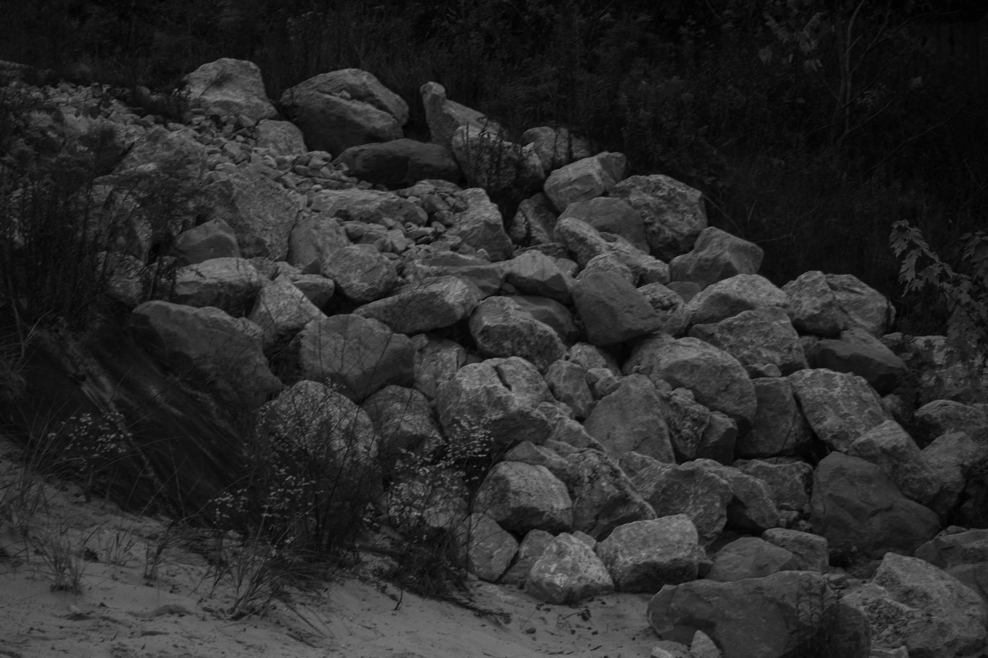 A pile of small boulders on the beach.